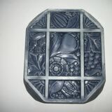 Enameled cast iron trivet. Art Deco