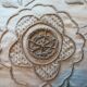 Round off-white tablecloth embroidered with grey flowers with 8 matching napkins - festive table