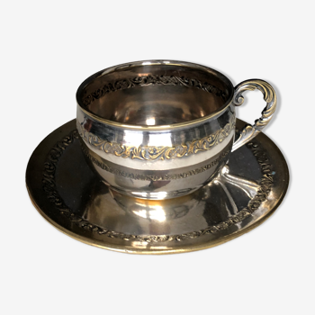 Cup and saucer in silver metal