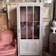 Small Parisian Art Deco glass cabinet with white patina - a timeless classic.