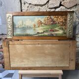 Pair of Art Deco wood and embossed metal landscape frames