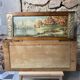 Pair of Art Deco wood and embossed metal landscape frames