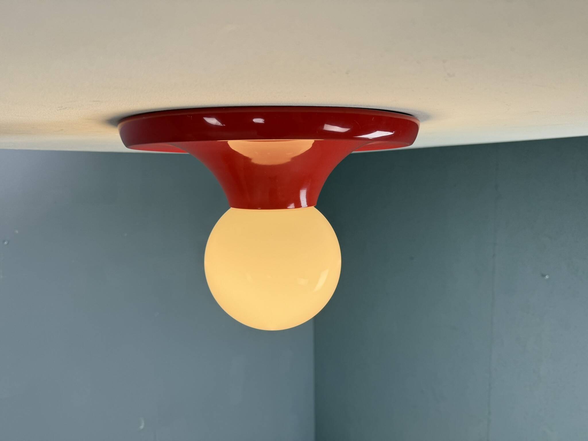 Castiglioni red metal "Light Ball" wall or ceiling lamp for Flos, Italy 1970s