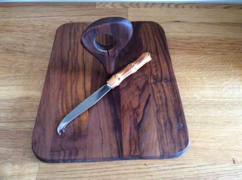 Cheese platter and his knife cutting board kitchen utensils