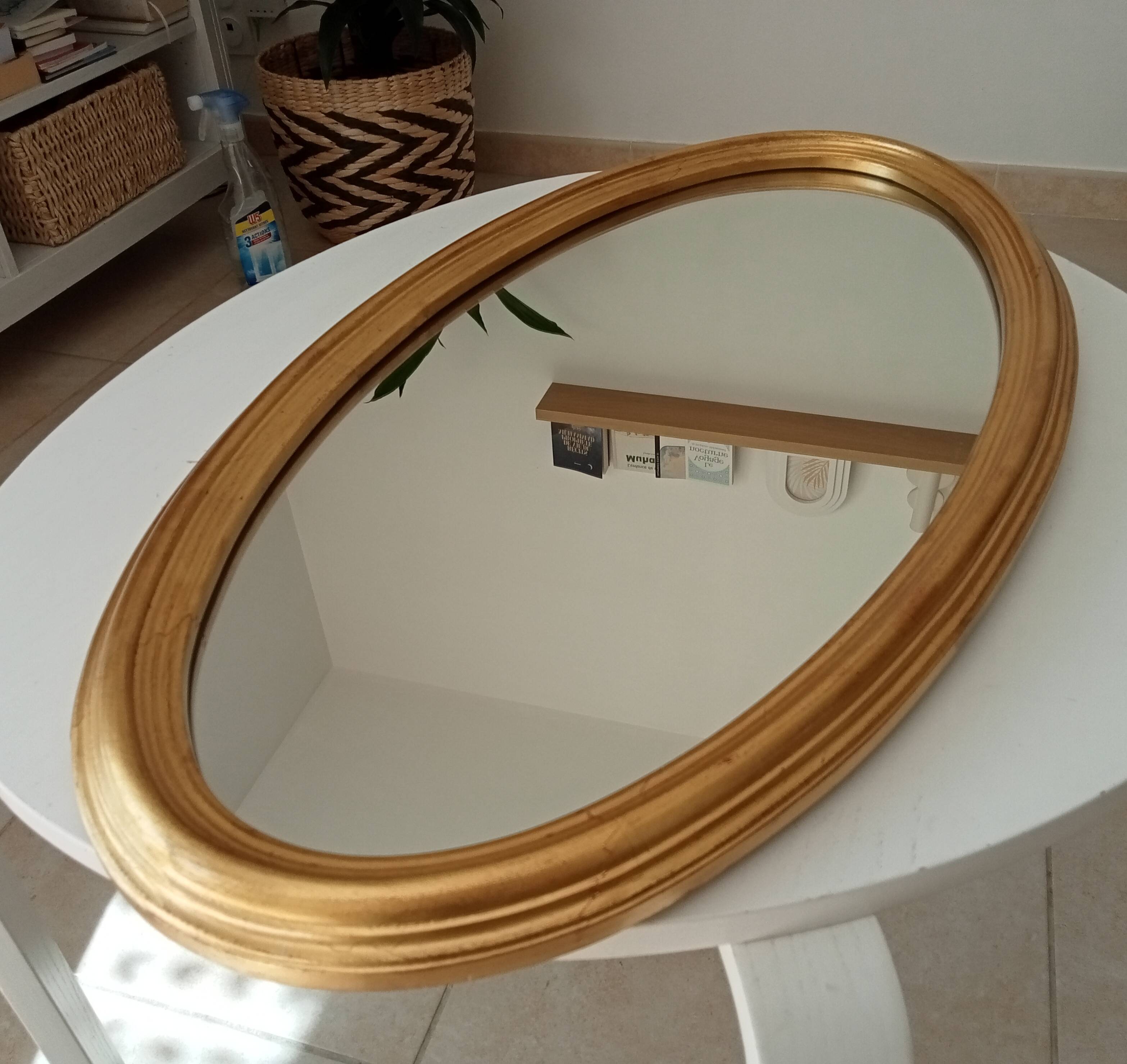 Miroir vintage ovale en bois doré années 60 77*41 cm