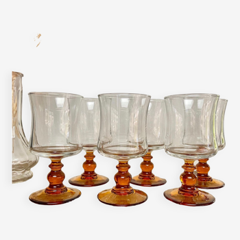 6 small amber-stemmed glasses