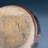 Signed black and red glazed stoneware pitcher, French artisanal ceramics