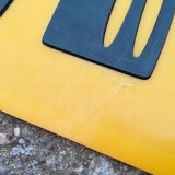 Old yellow "furniture" sign