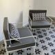 Vintage white metal Croisette style armchairs with hairpin legs in superb condition