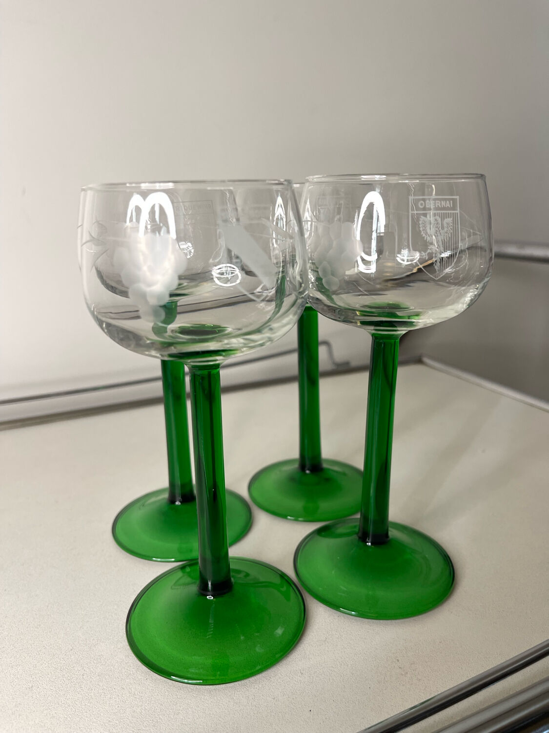 Set of 4 antique Alsace wine glasses, green stem and engraved decoration