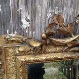 Wooden fireplace mirror and Gilded Louis XVI-style plaster with leaf
