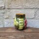 Small jug, milk pot in slipware with relief fruits Salins les Bains
