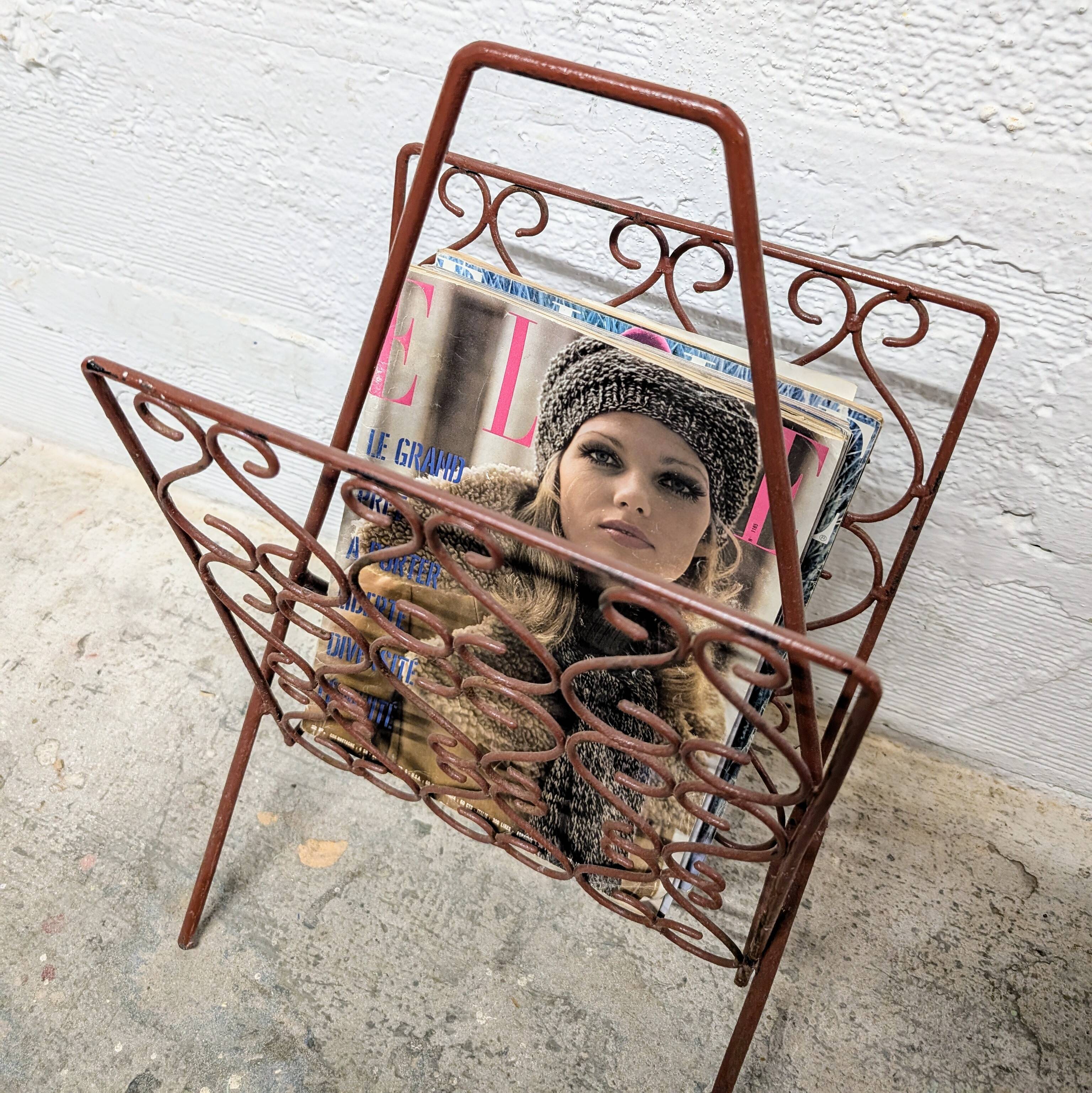 Vintage wrought iron magazine rack