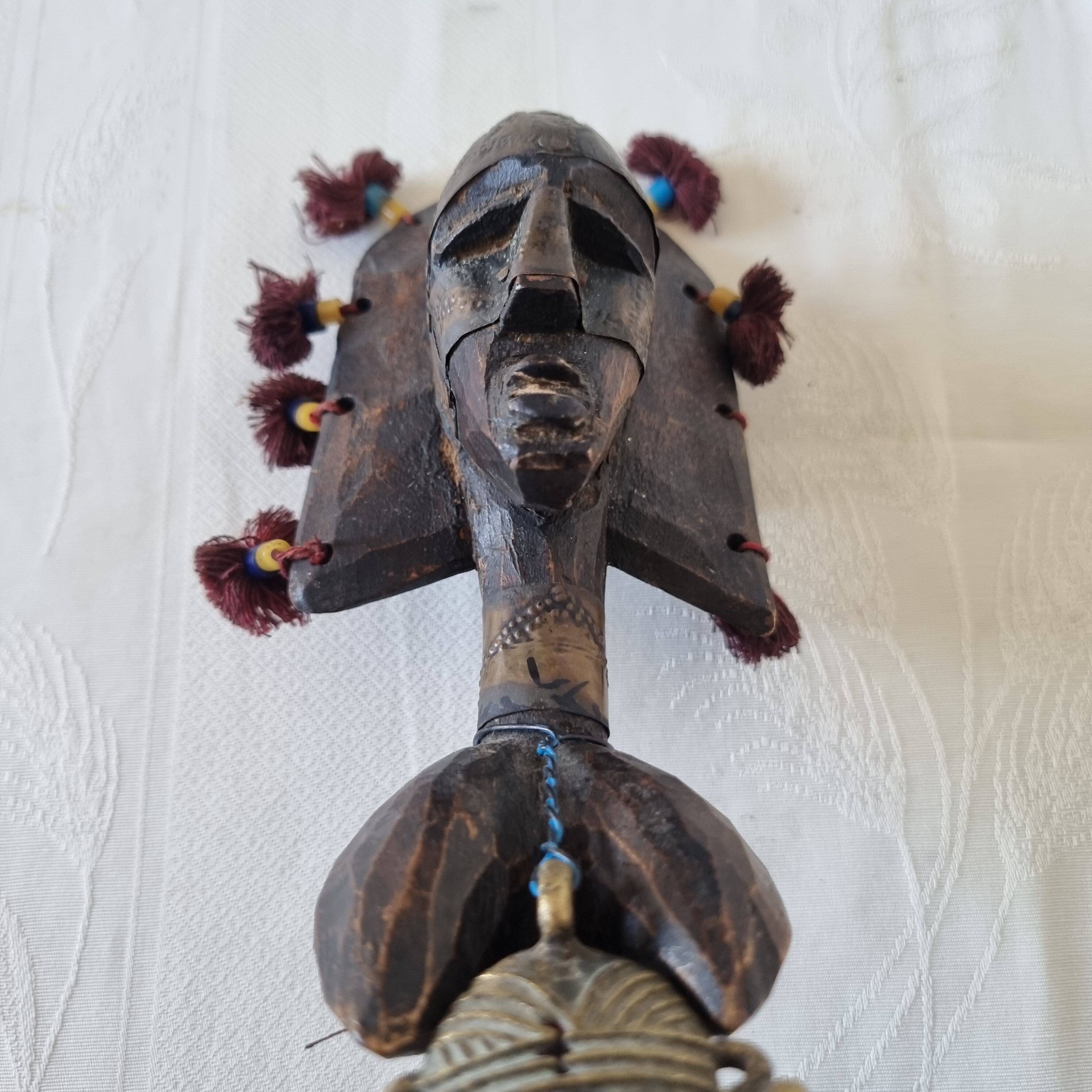 Scepter decorated with a female figure in wood and brass