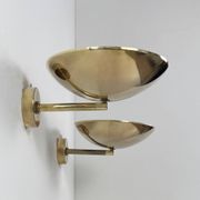 Pair of adjustable vintage wall lights, patinated brass, France, 1970.