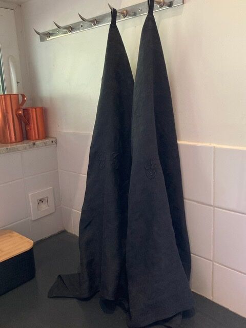 Pair of black monogrammed towels