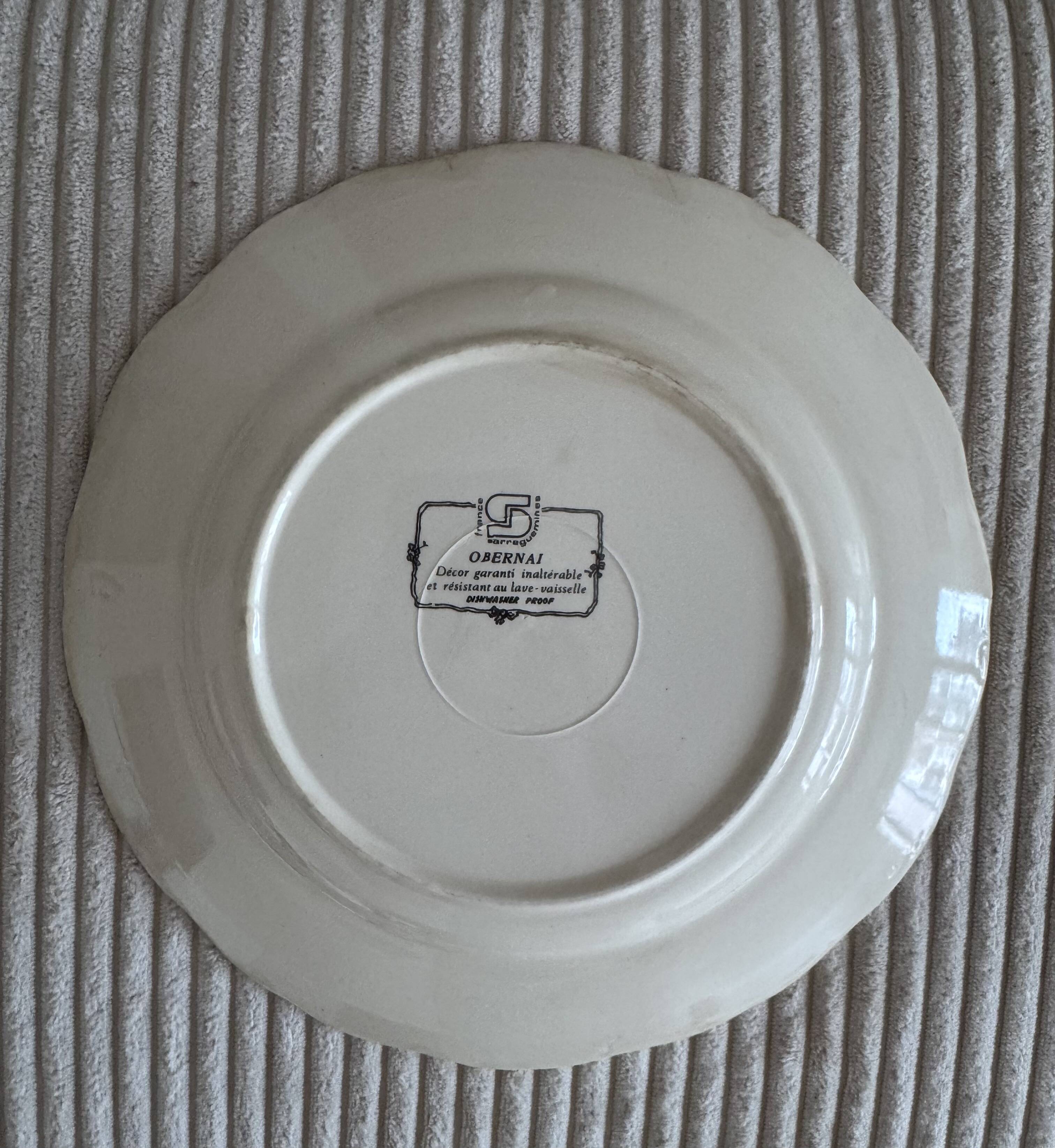 Obernai plates by Henri Loux, pottery from Sarreguemines.