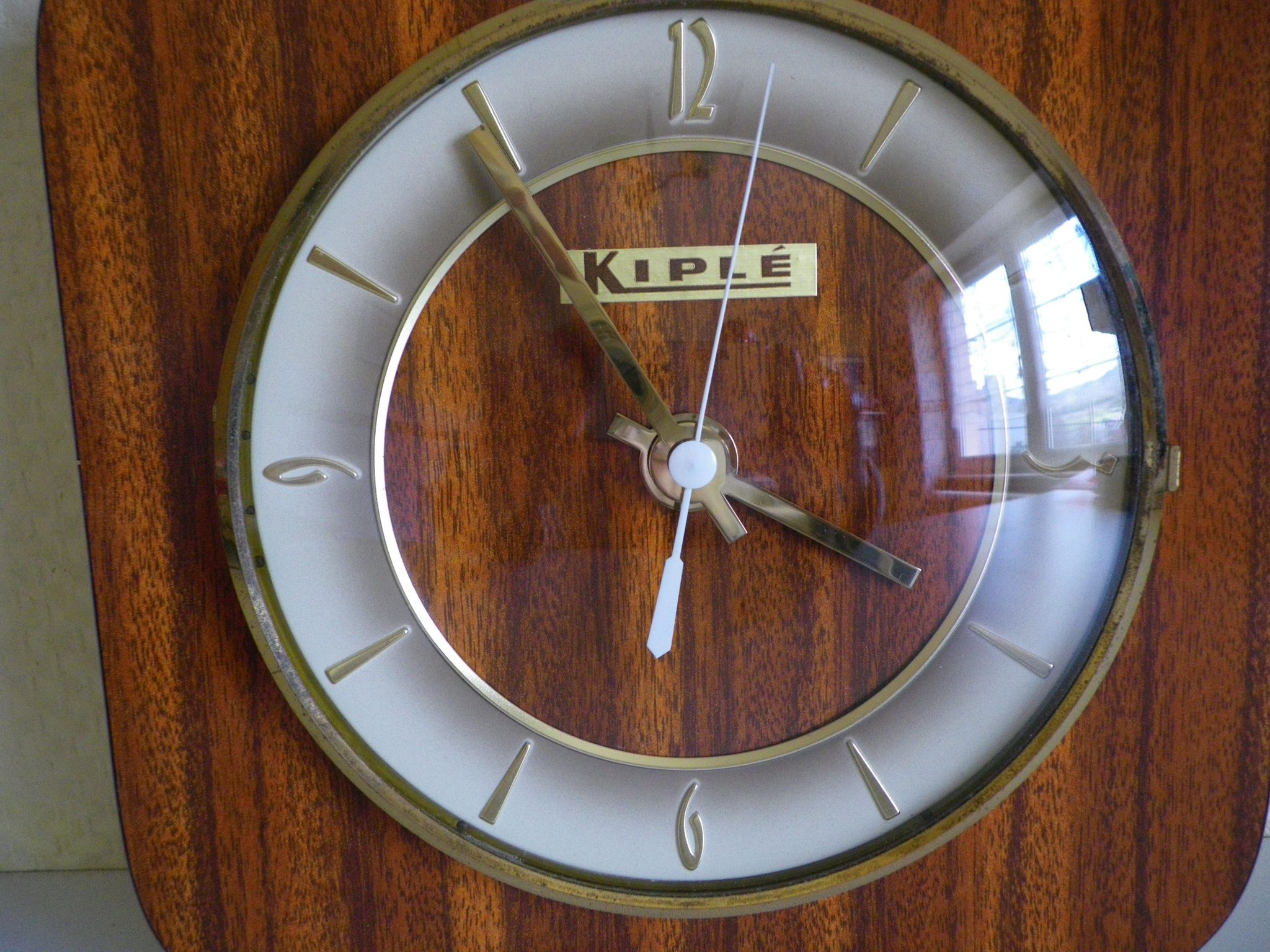 Clock in mahogany formica, metal, wood, glass, in its original box - Brand KIPLE - 70s