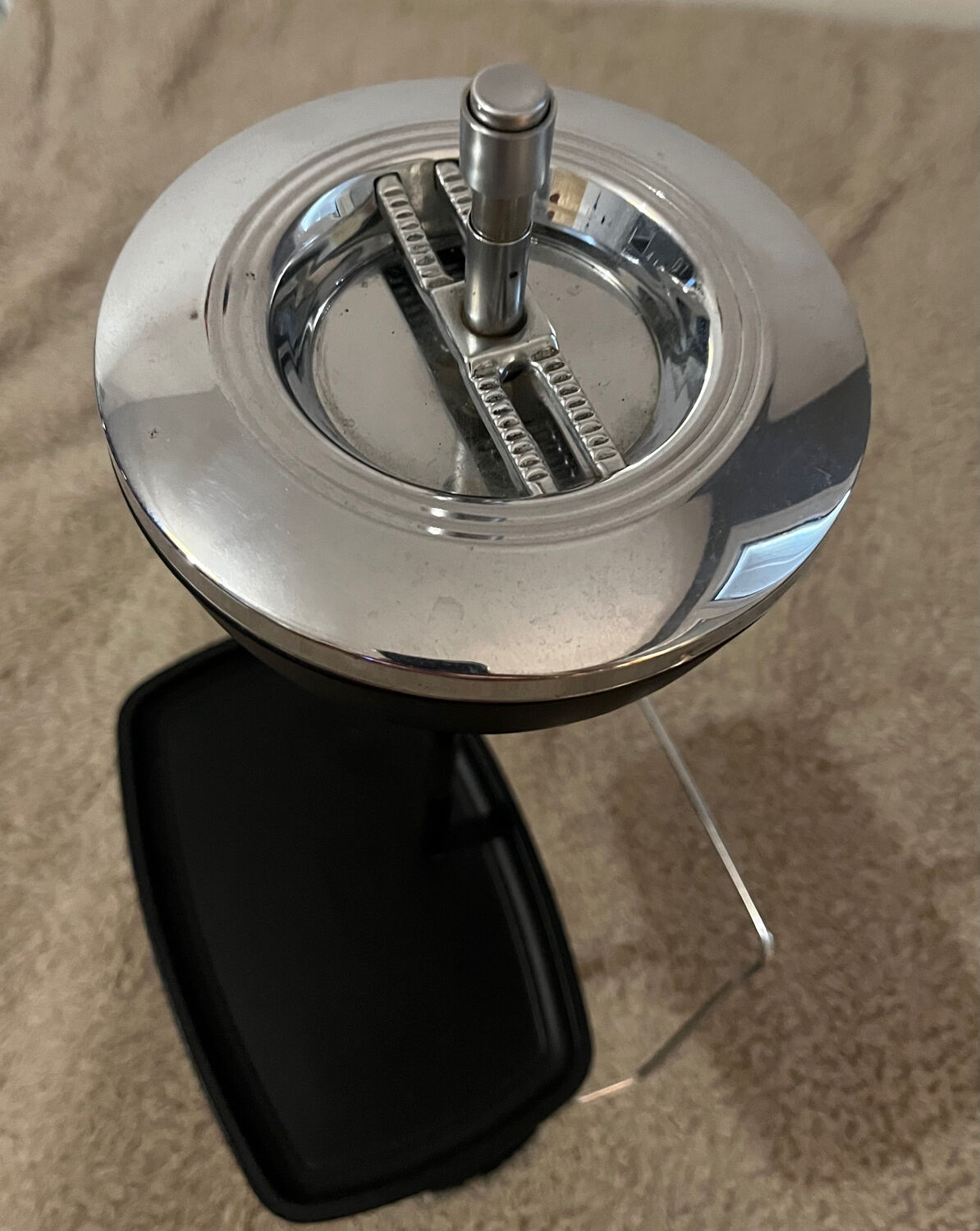 Vintage metal ashtray with magazine holder