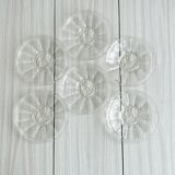 Set of 6 dessert plates, transparent glass with engraved flower pattern.