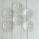 Set of 6 dessert plates, transparent glass with engraved flower pattern.