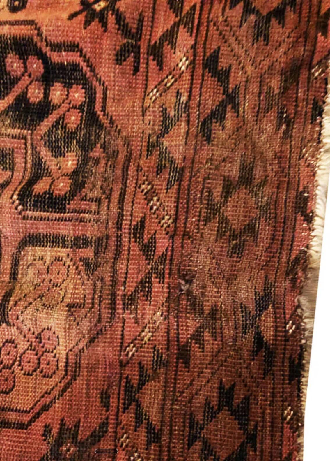 Antique Afghan/Turkmen wool rug, gul patterns, red and brown tones.