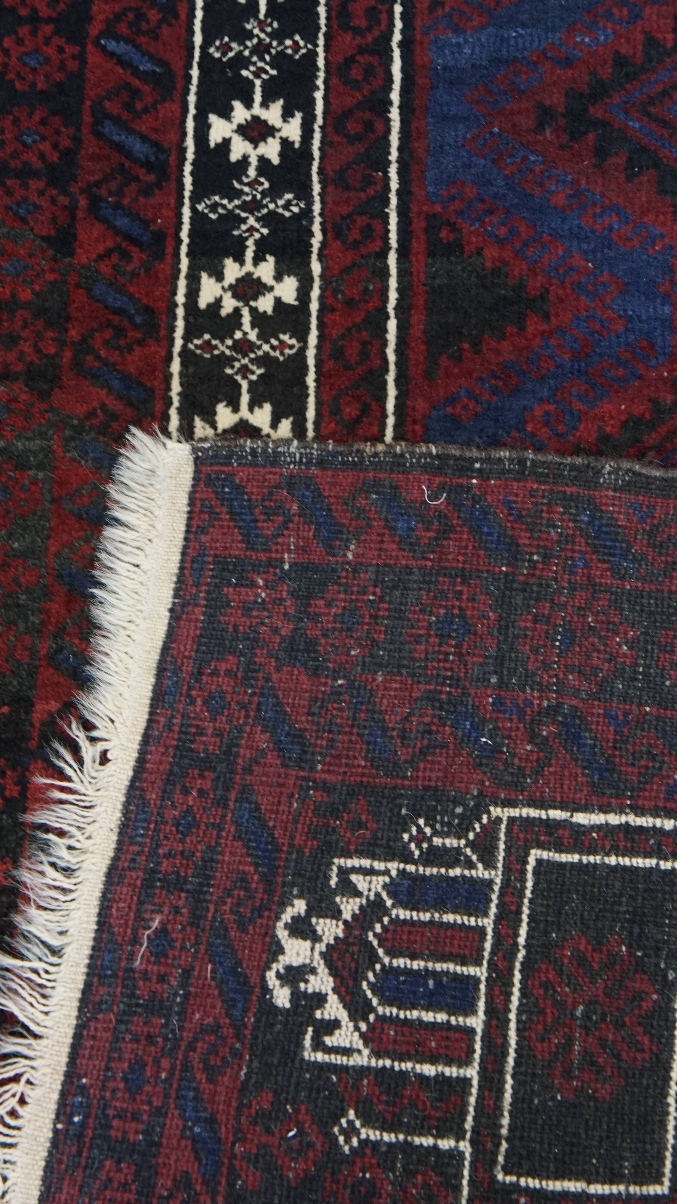 Hand-Knotted Rug with Burgundy Red, Dark Blue, and Beige Tones 143x88 cm