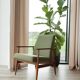 Vintage armchair in swamp green bouclé design by H. Lis.