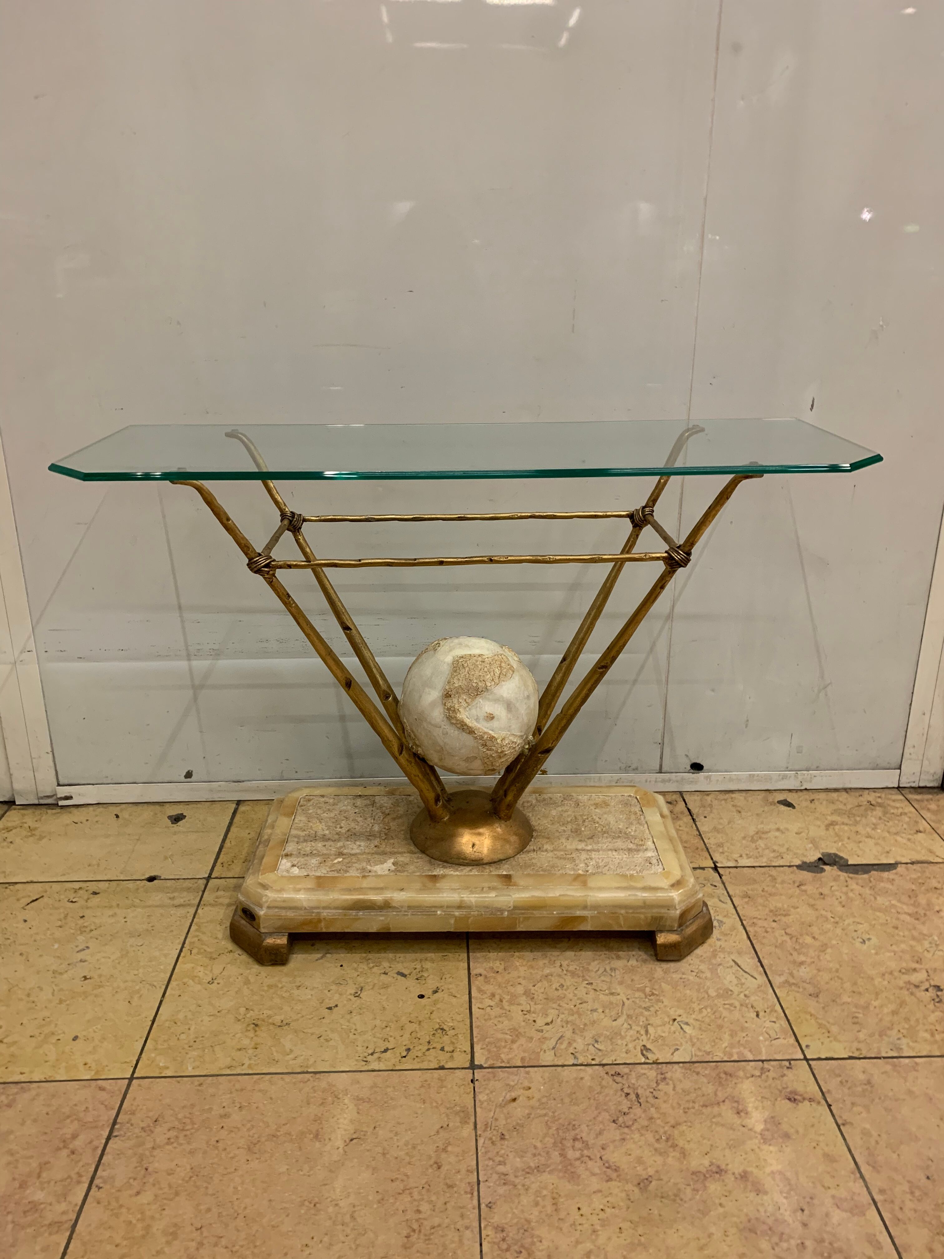 Travertine console from Fournier Paris over glass