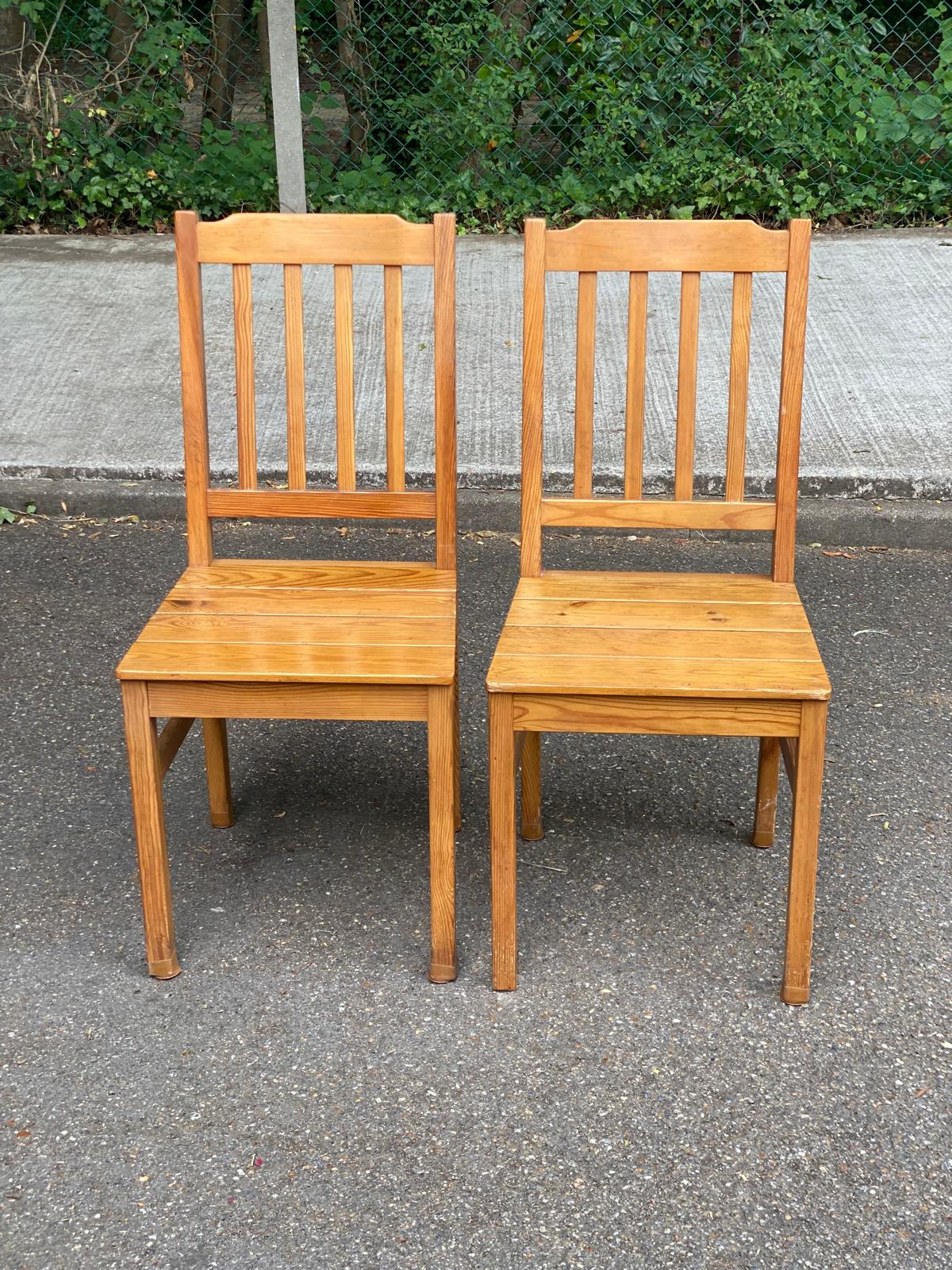 2 solid wood dining chairs