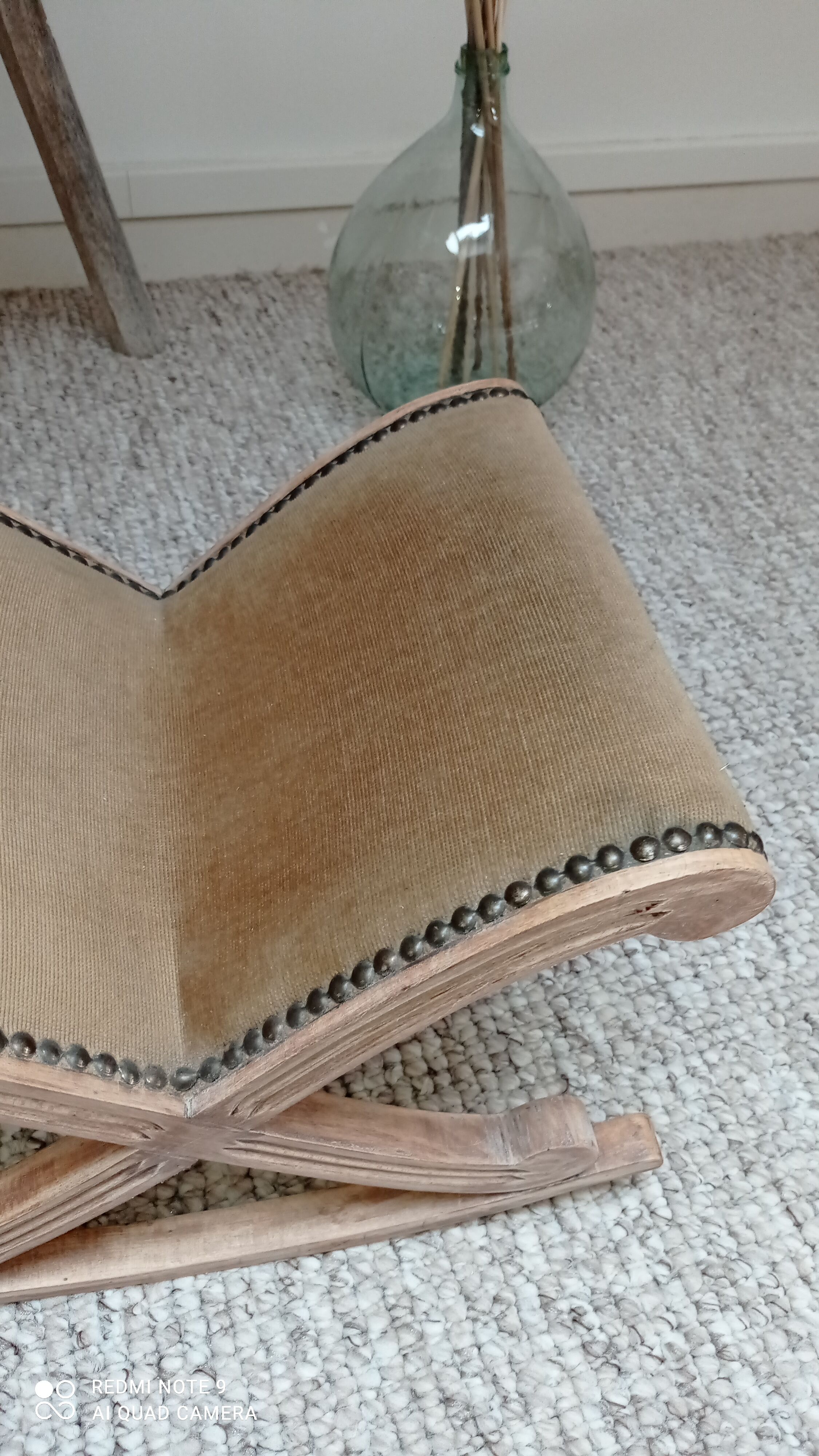 Footrest upholstered in wood