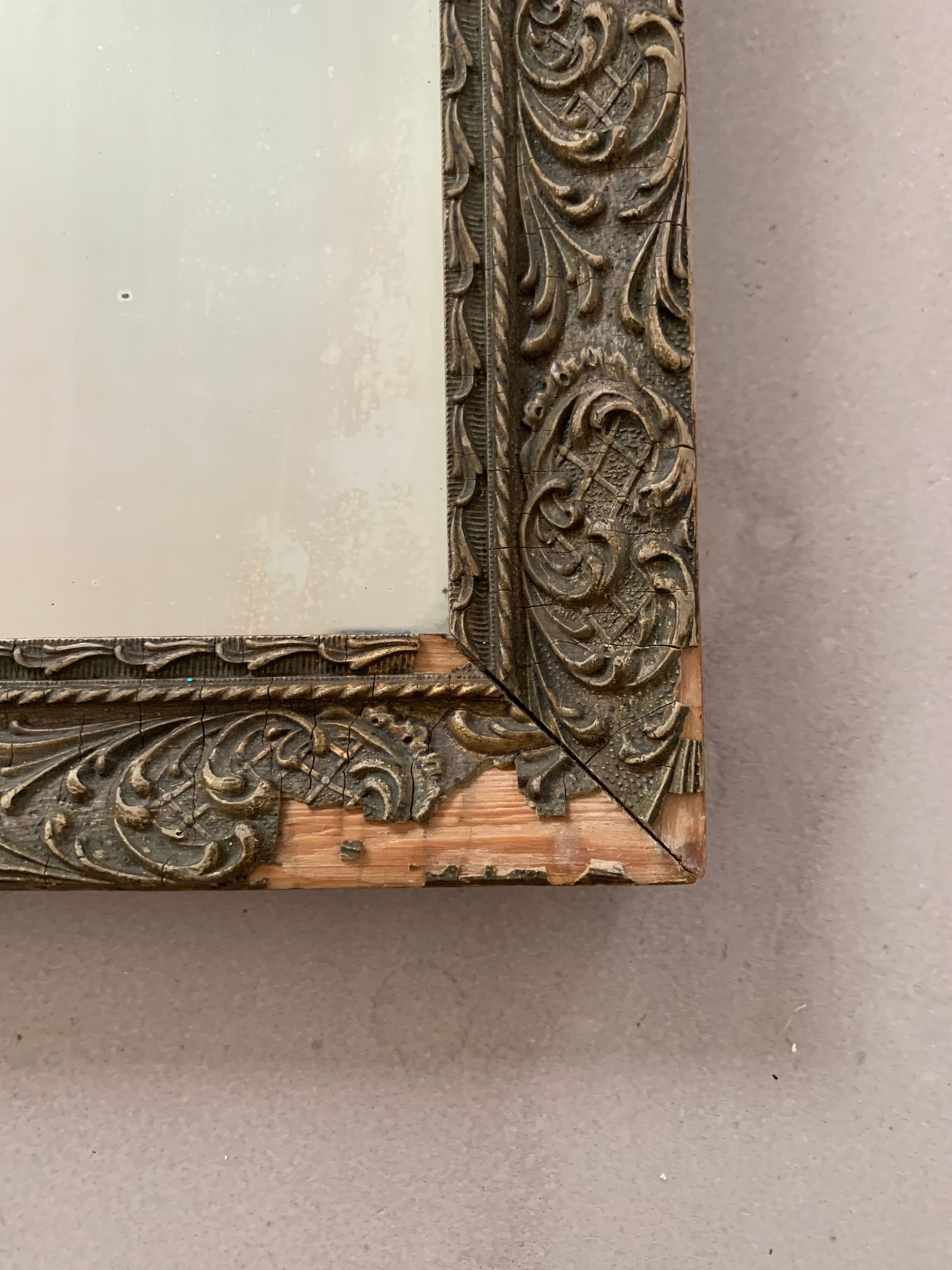 Old stitched golden mirror