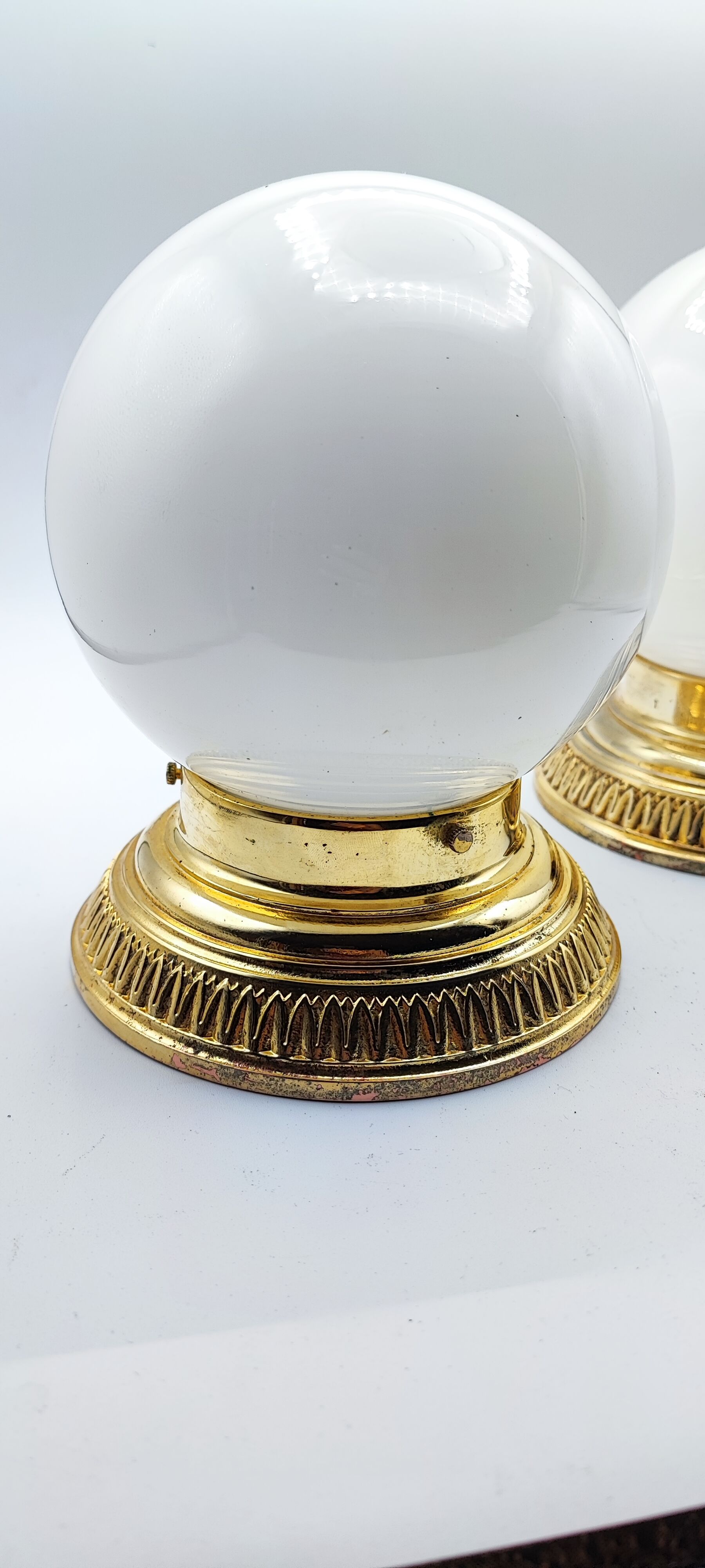 Pair of white opaline sconces