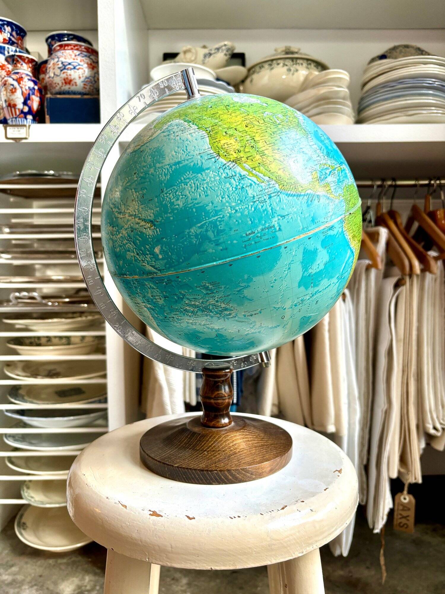 World map, globe with wooden base
