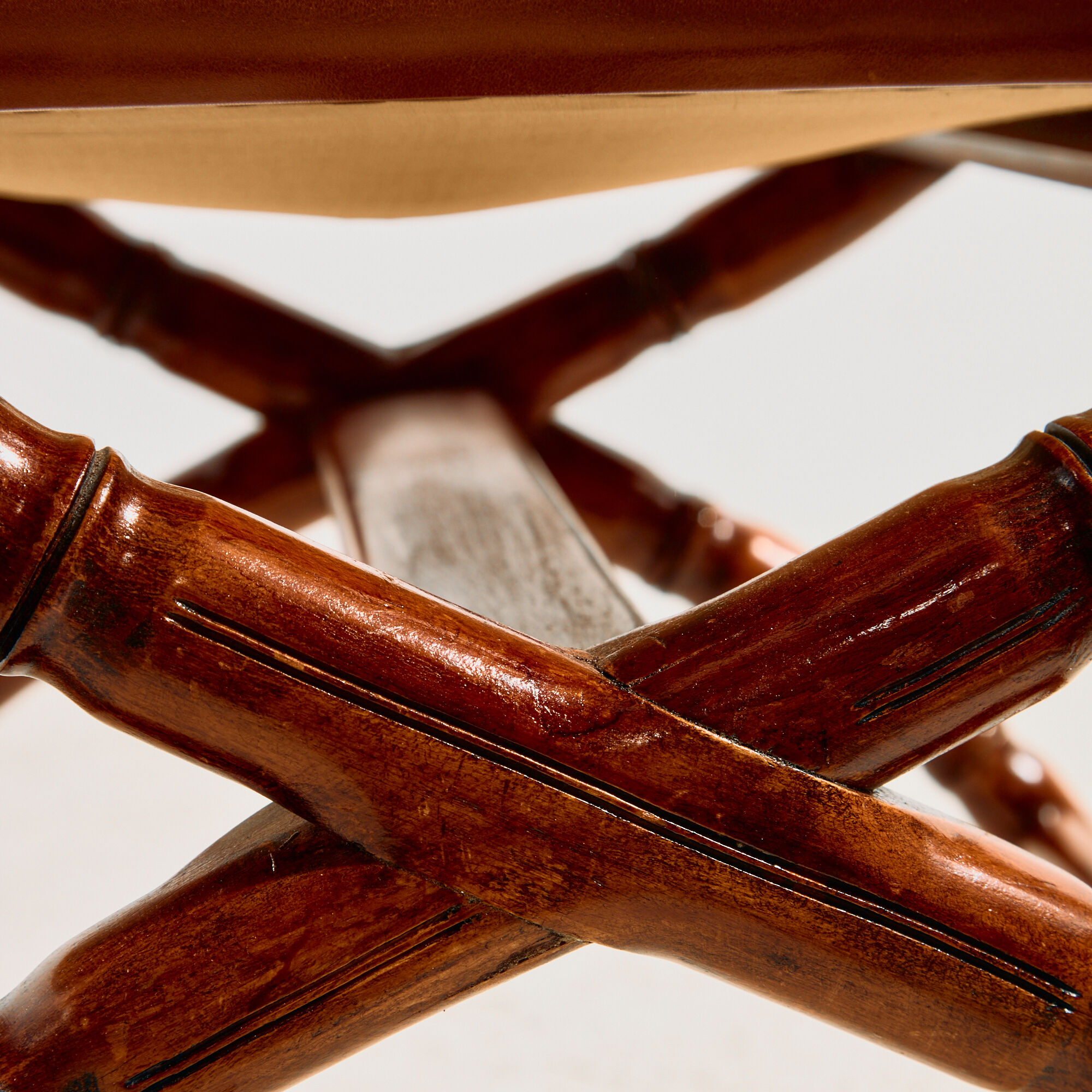 Walnut armchair with bamboo design