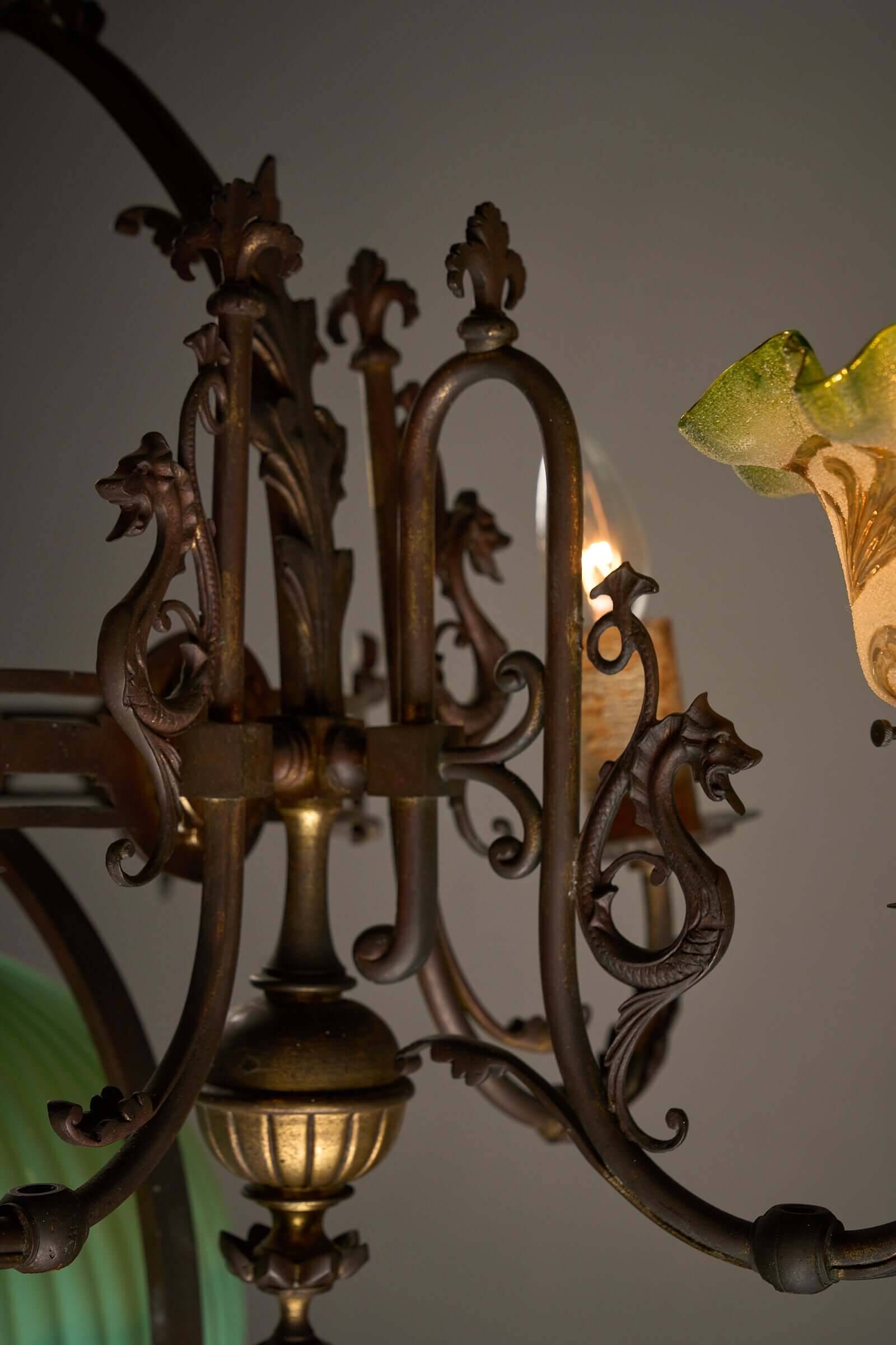 Antique adjustable height chandelier with original glasswork and brass detailing