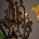 Antique adjustable height chandelier with original glasswork and brass detailing