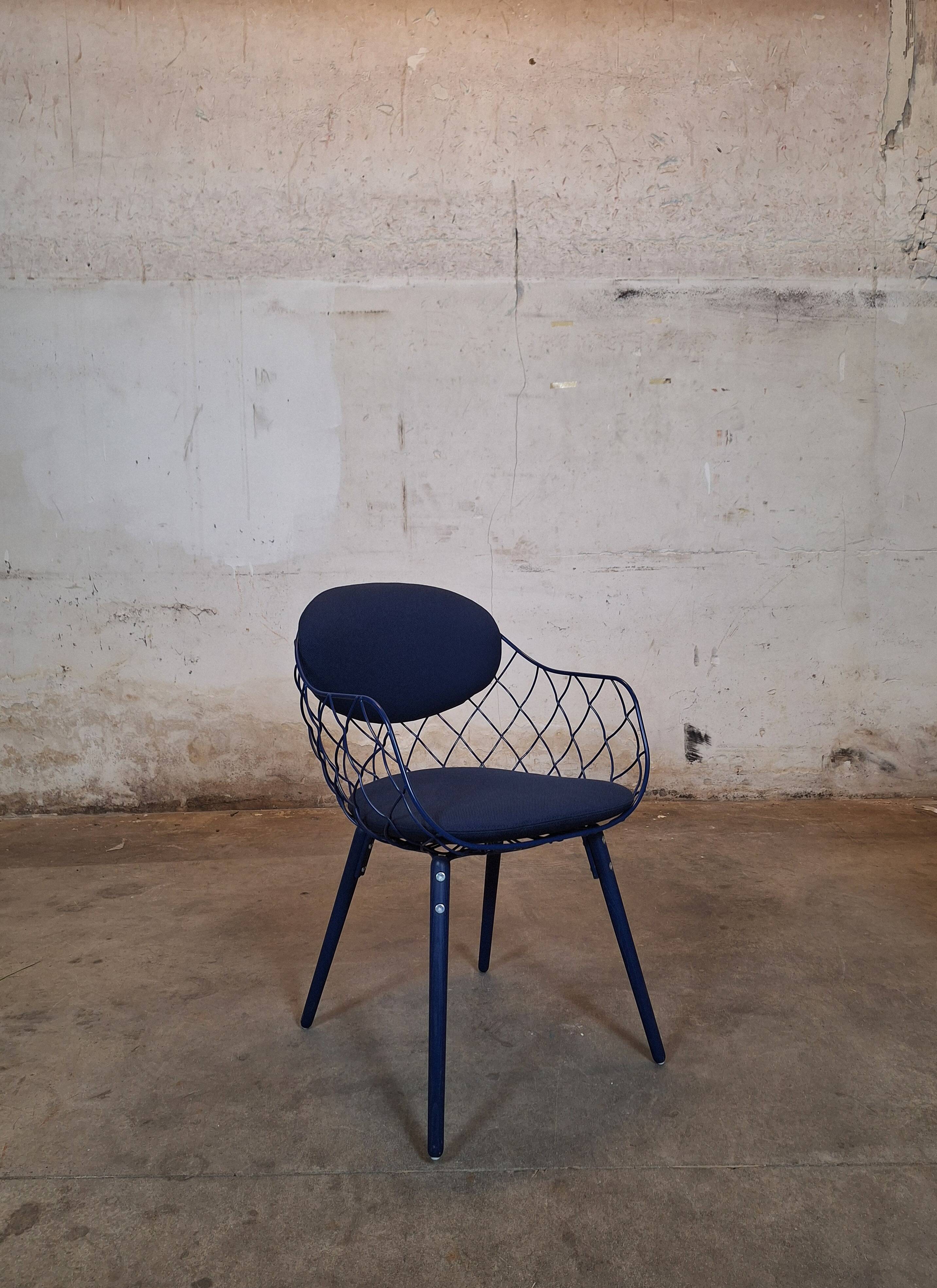 Magis Piña blue chair with metal frame and padded seat