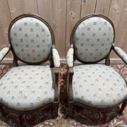 Pair of cabriole armchairs with medallion backs from the Louis XVI period, stamped OT.