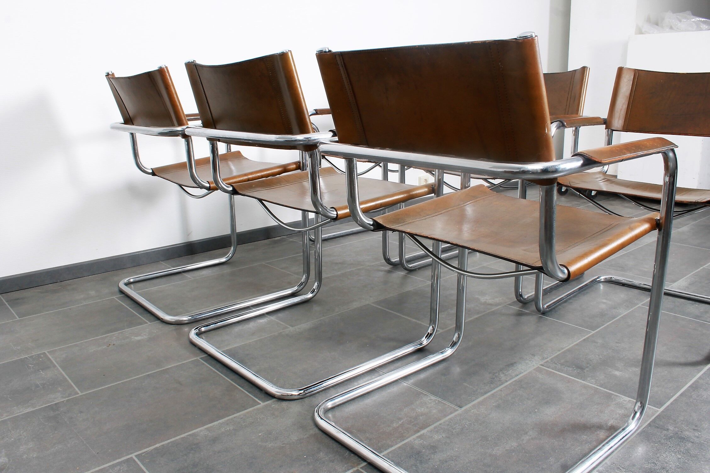 Set of six brown leather cantilever chairs Mart Stam