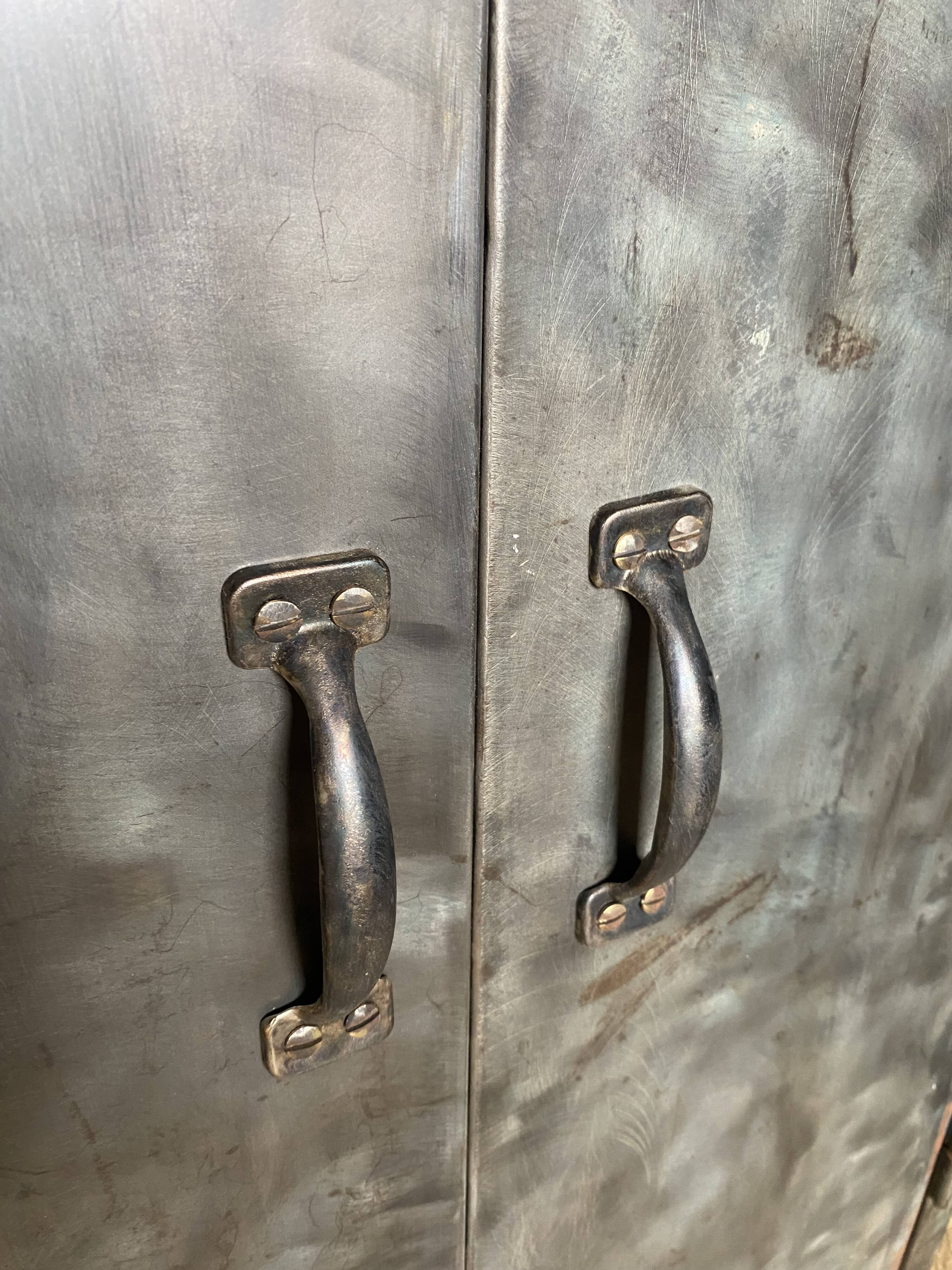 Metal workshop cabinet with two doors.