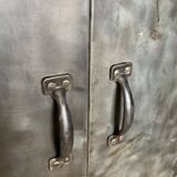 Metal workshop cabinet with two doors.