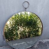 Round patinated mirror