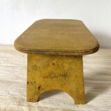Low stool, plant stand in yellow painted wood
