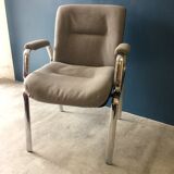Chrome and wood armchair from the 70s