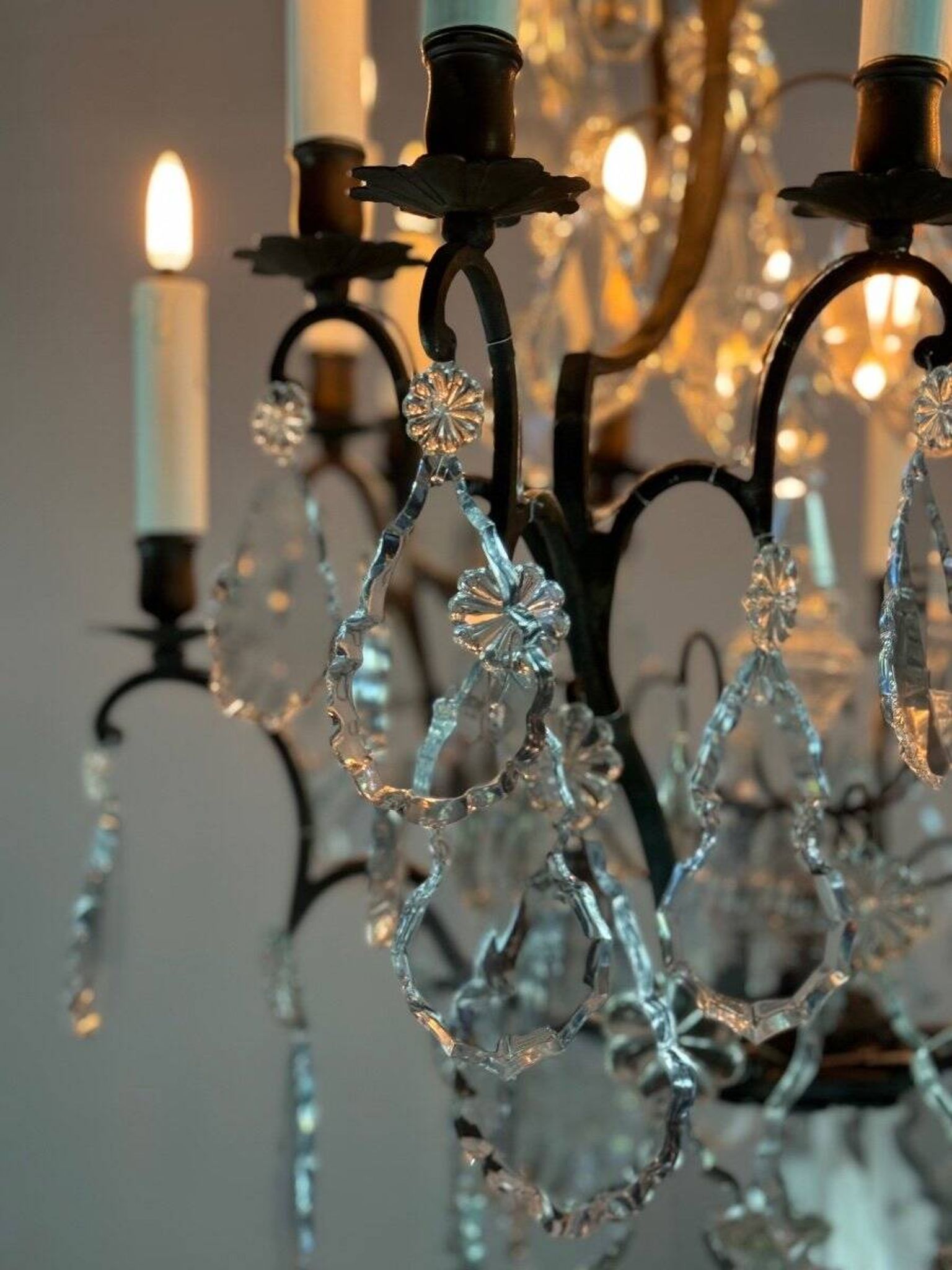 Black patinated bronze cage chandelier decorated with cut crystal pendants circa 1900