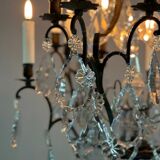 Black patinated bronze cage chandelier decorated with cut crystal pendants circa 1900
