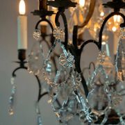 Black patinated bronze cage chandelier decorated with cut crystal pendants circa 1900