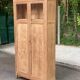 Parisian bonnetière cabinet, stripped display in solid oak from the 1930s.