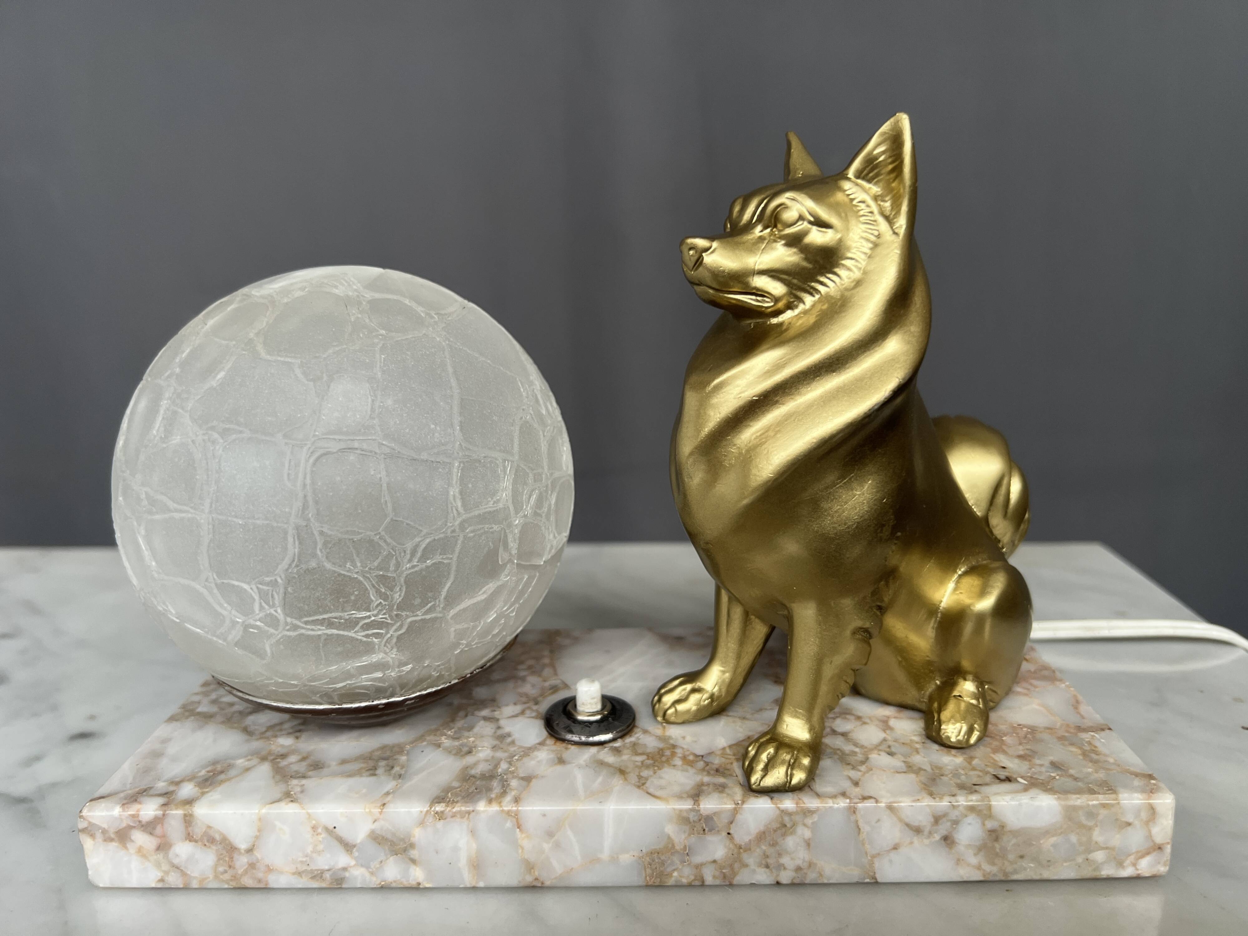 Night lamp with a Spitz figurine in Art Deco style on a marble base.